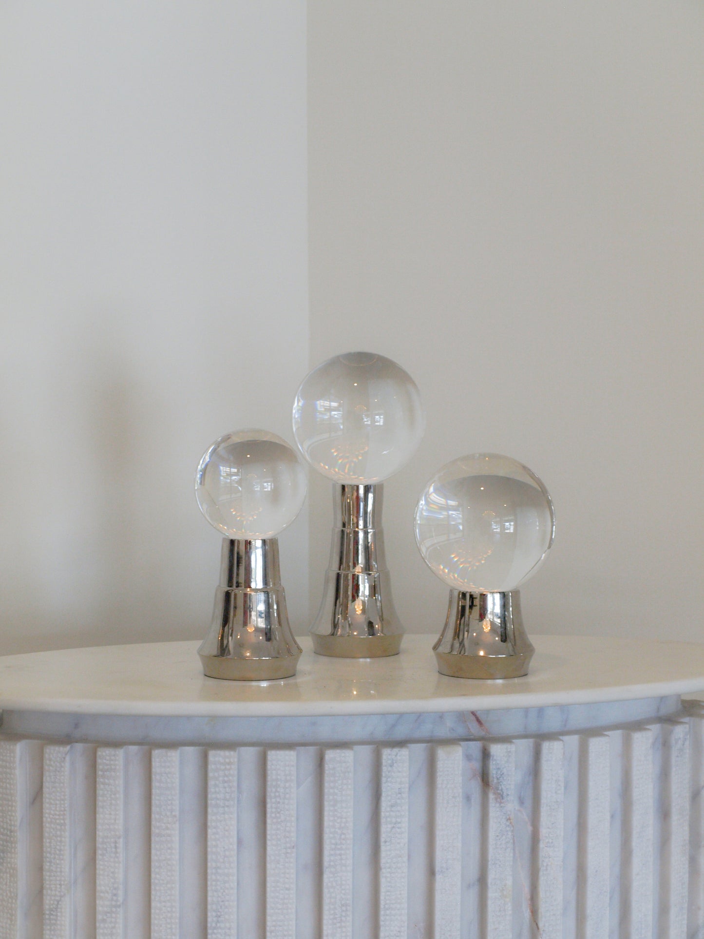 CRYSTAL SPHERES ON STANDS