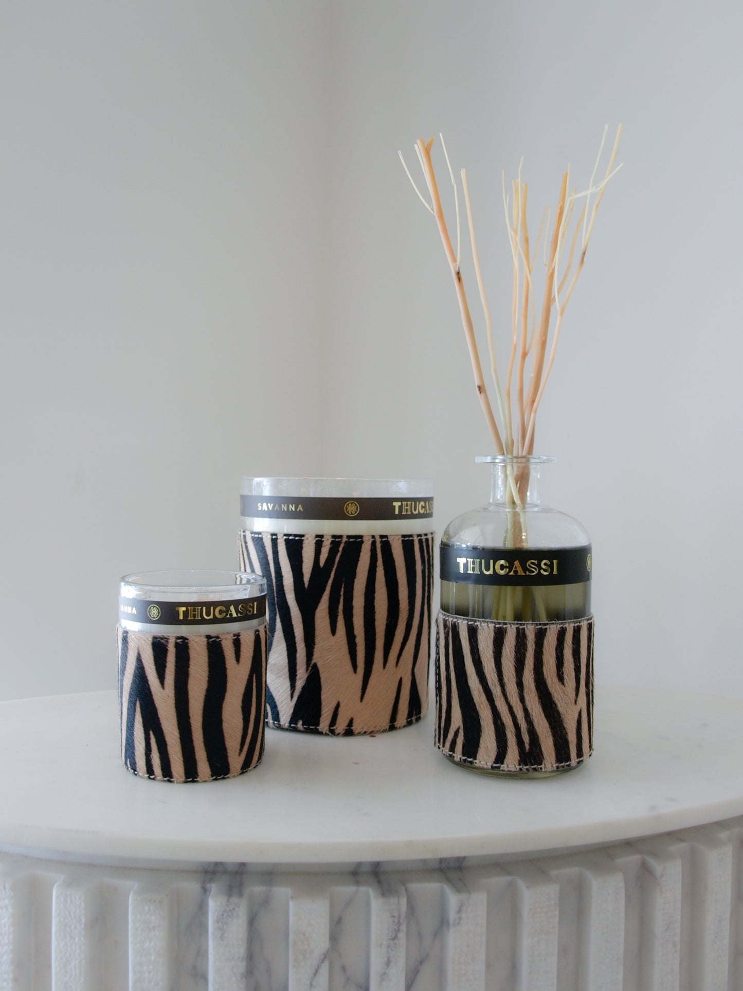 THUCASSI SAVANNA CANDLE MARA NIGHTS 8OZ.